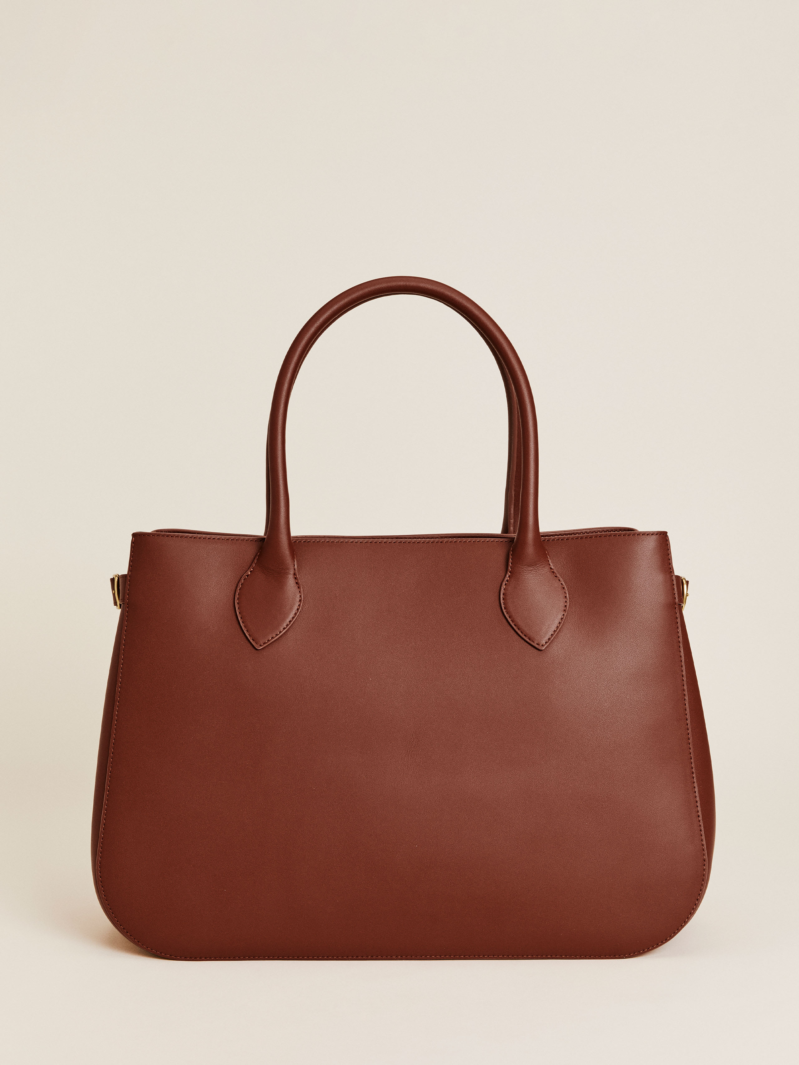 Shop Reformation Oversized Patrizia Bowling Bag In Whiskey