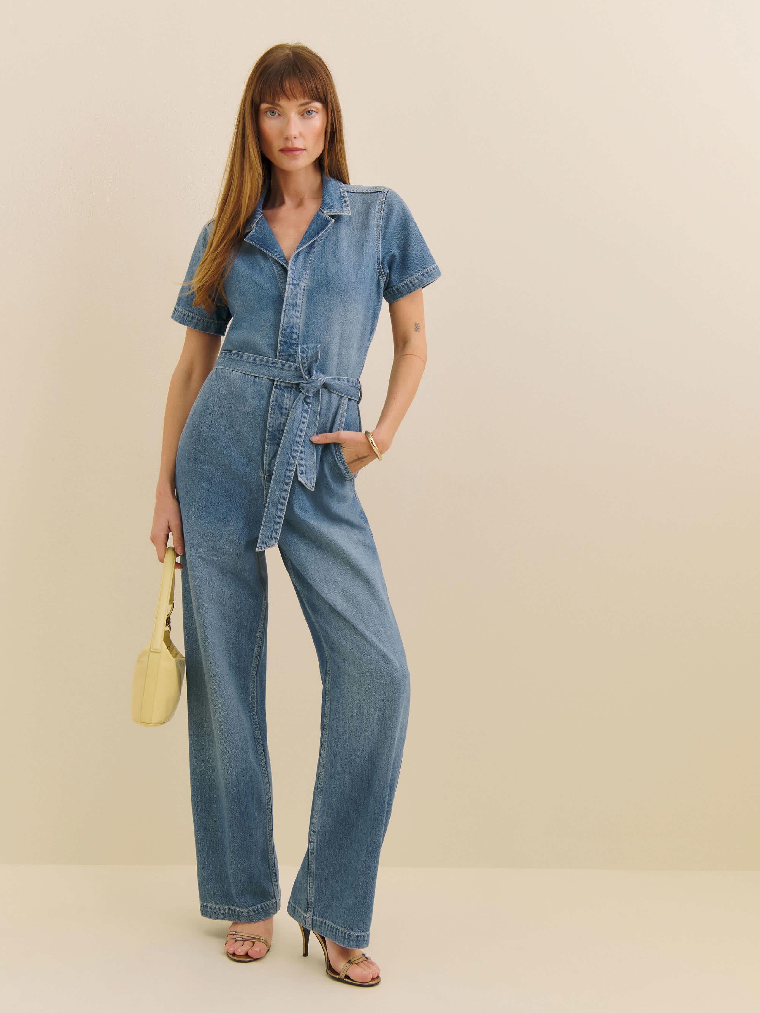 REFORMATION GRAHAM LIVED-IN DENIM JUMPSUIT 