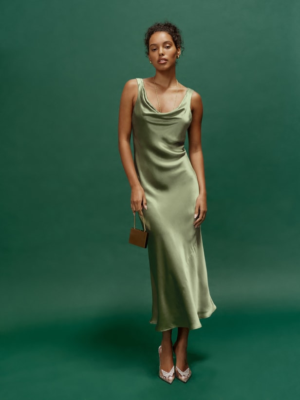 Reformation Artichoke Green sleeveless, midi dress with a cowl neckline and A-line silhouette. It's relaxed fitting throughout for some extra comfort.

