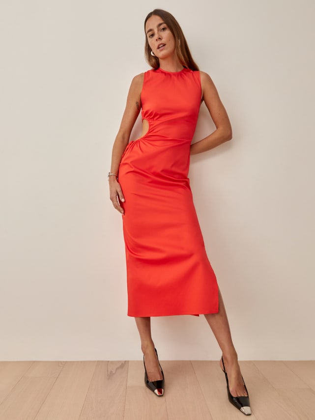 Midi length stretch cotton round neck sleeveless dress with keyhole cutout at the waist and drawstring ruched effect. 