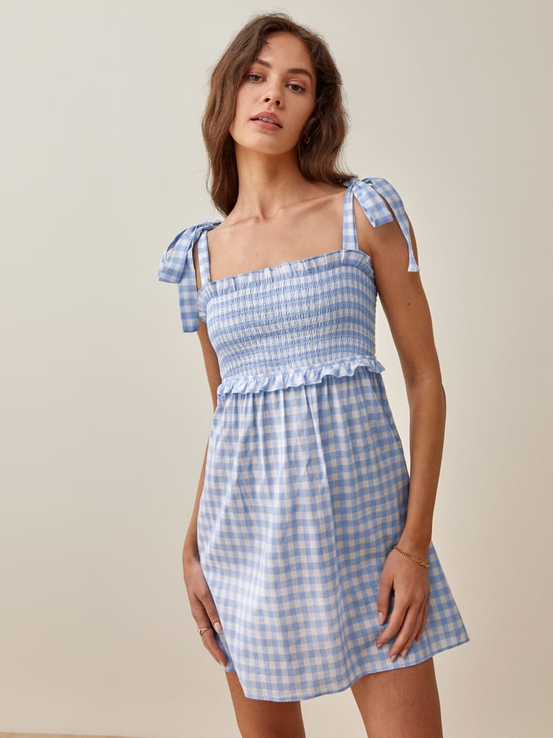reformation gingham dress Violaine Linen and smocked back for added comfort. Reformation Tavi Linen Dress |