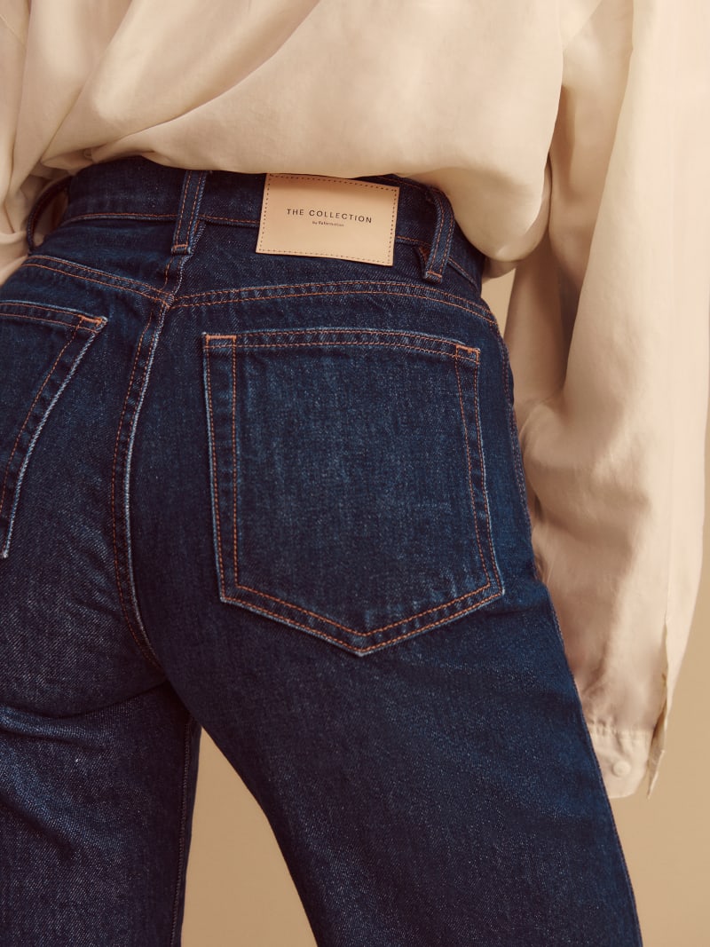 The Magnolia Mid Rise Bow Jeans