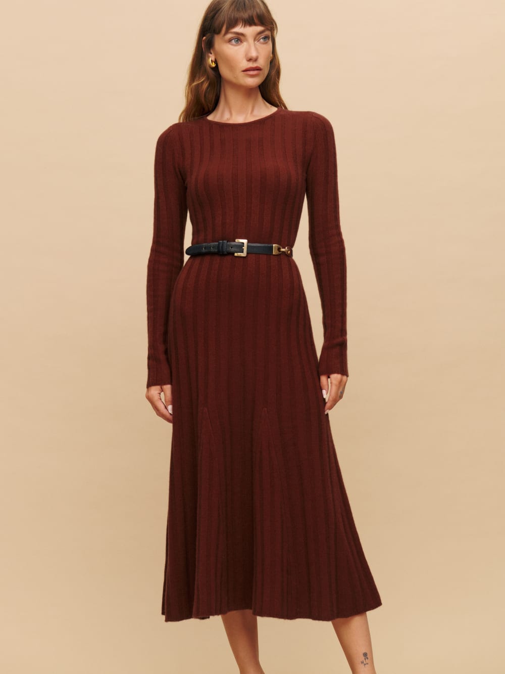 Reformation chianti cashmere sweater midi dress is designed to be fitted at bodice and waist with a relaxed skirt