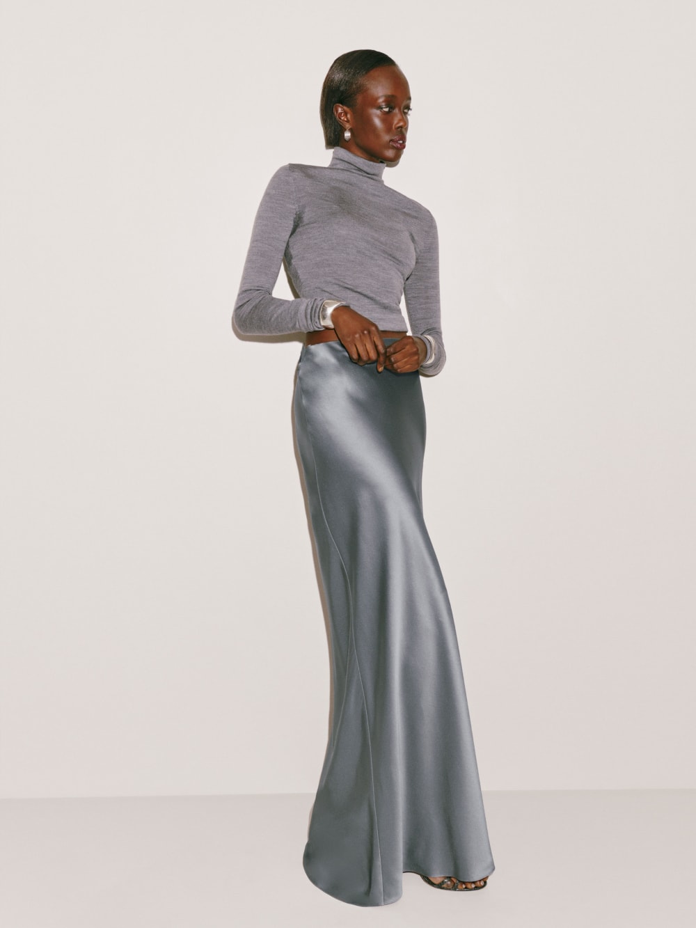 Reformation silver grey Bella slik slip maxi skirt is Designed to have a relaxed fit throughout. 