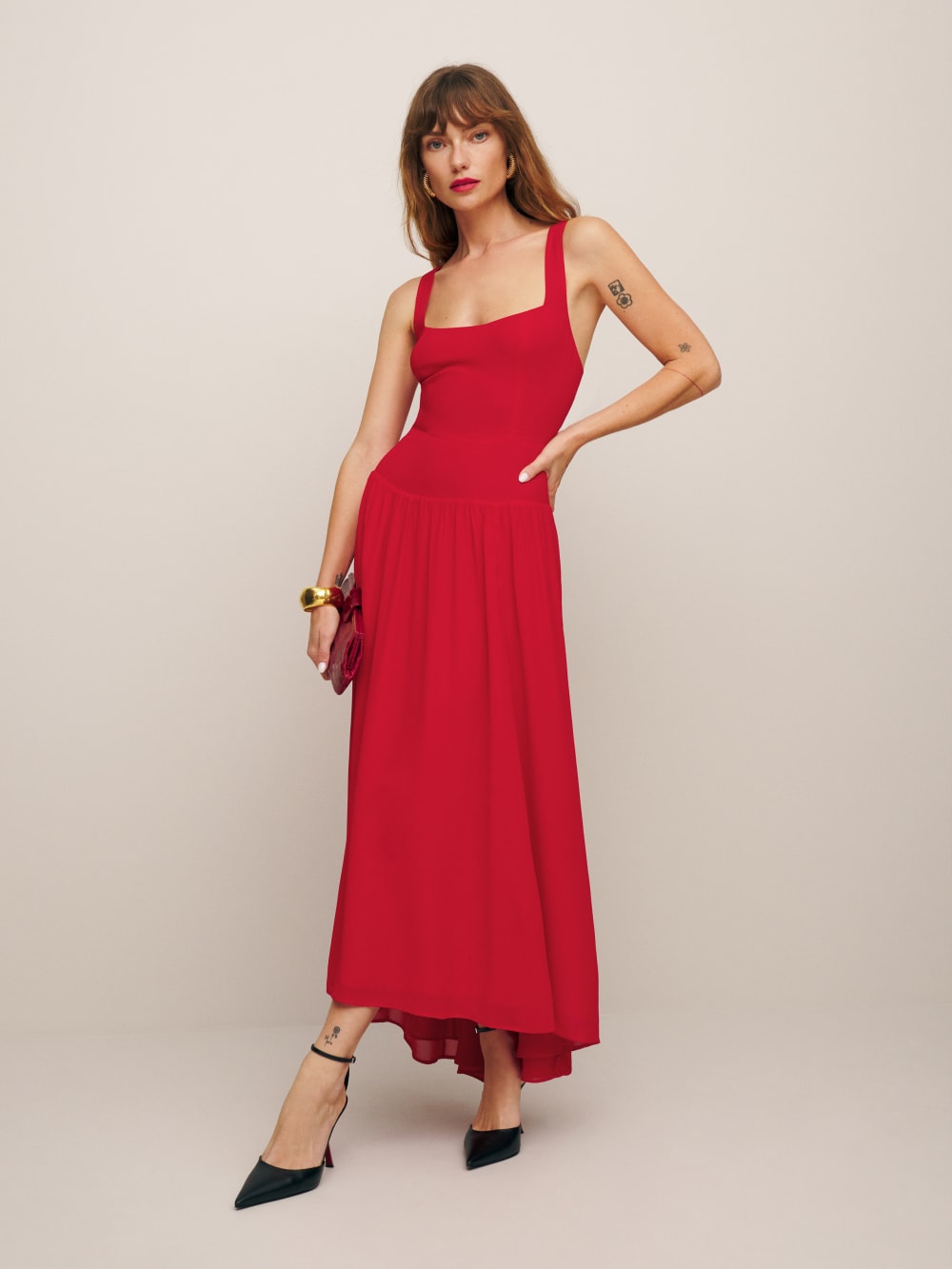 Reformation festive red party dress is Designed to be fitted at bodice with an A-line skirt, drop waist and wide straps and square neck. 