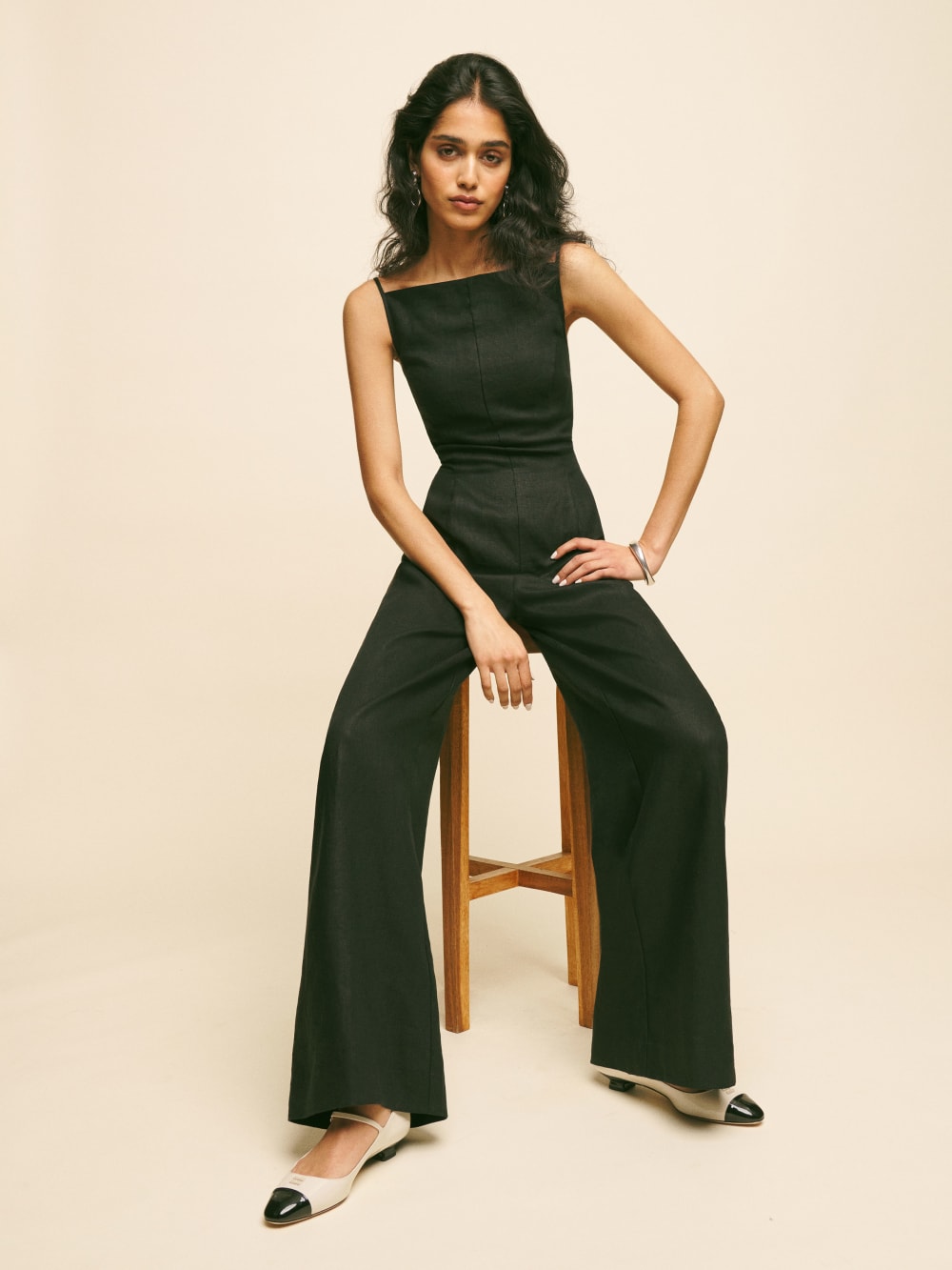 Reformation Ciara linen jumpsuit in black is Designed to be fitted at bodice with a relaxed leg.