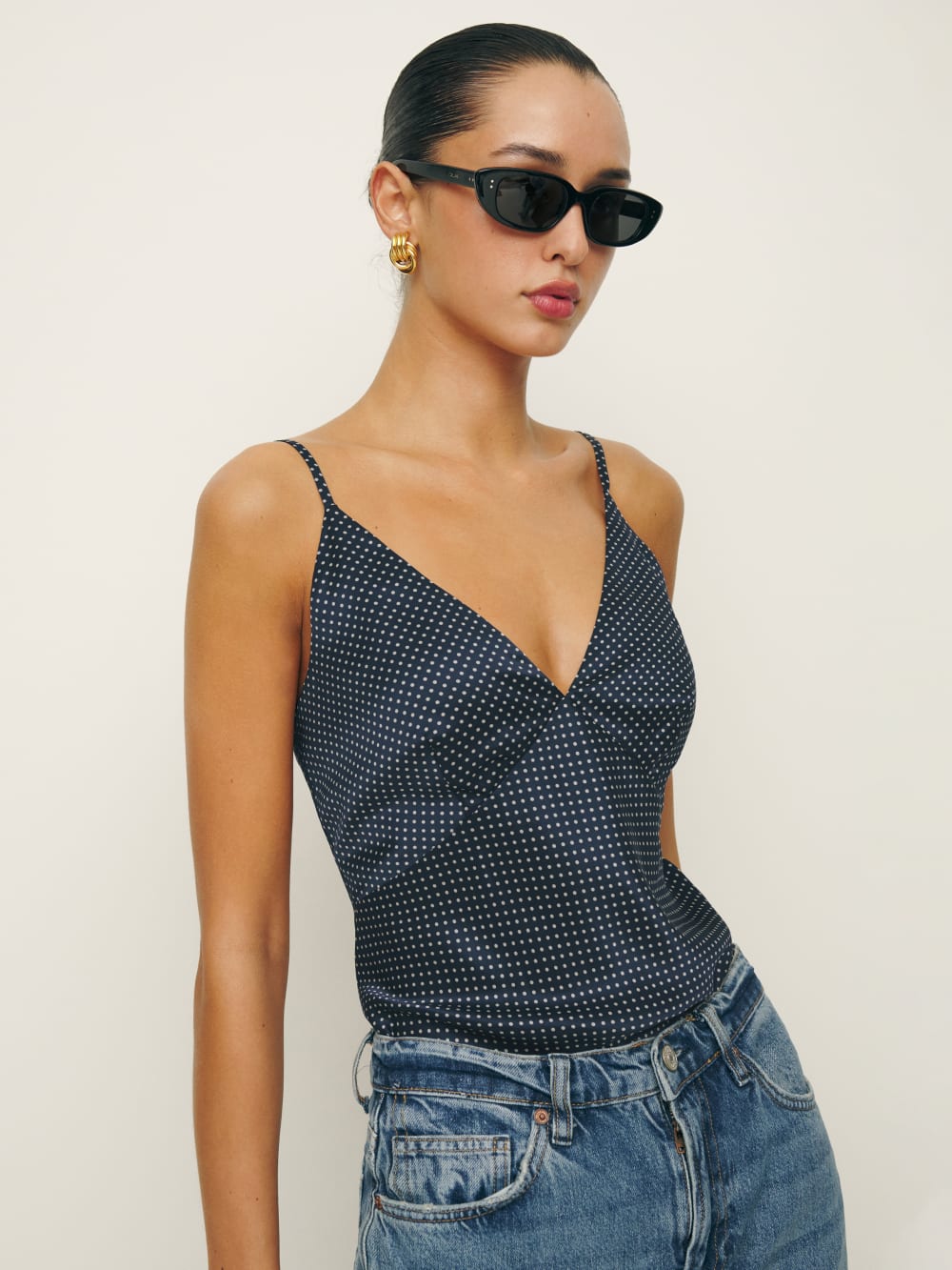 Mickey silk blue and white polka dot cami top with Adjustable straps.