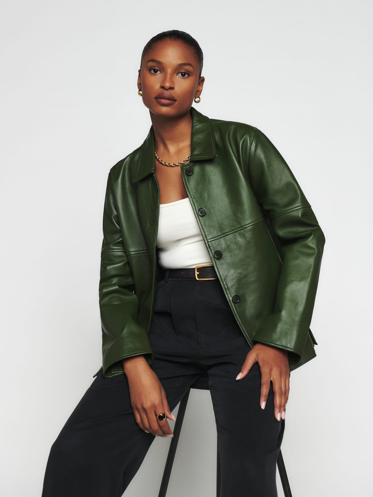 The Mercer is a relaxed fit, collared, shirt jacket with full-length sleeves in soft olive green leather.