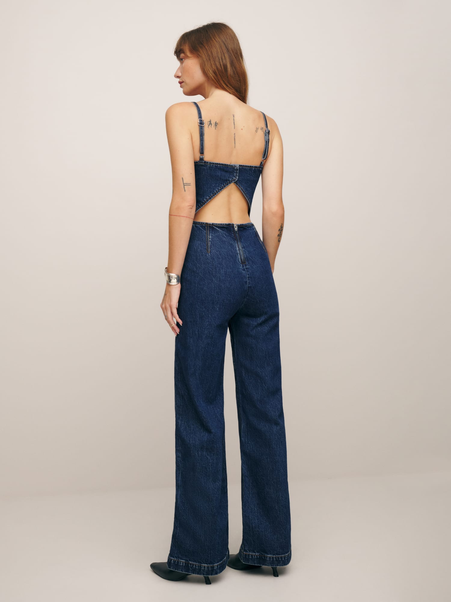 Reformation jean jumpsuit 2025