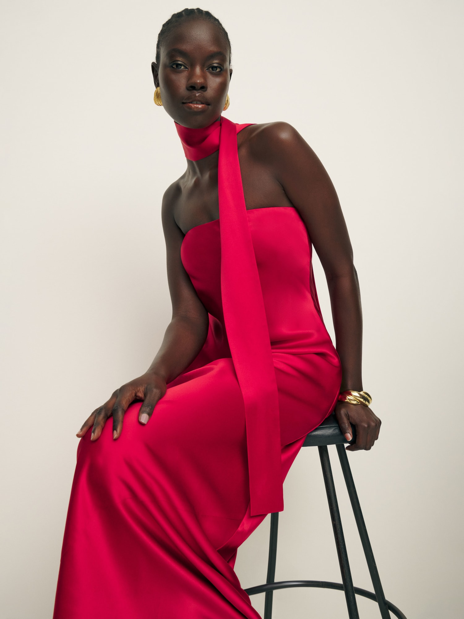 Woman in silk dress store