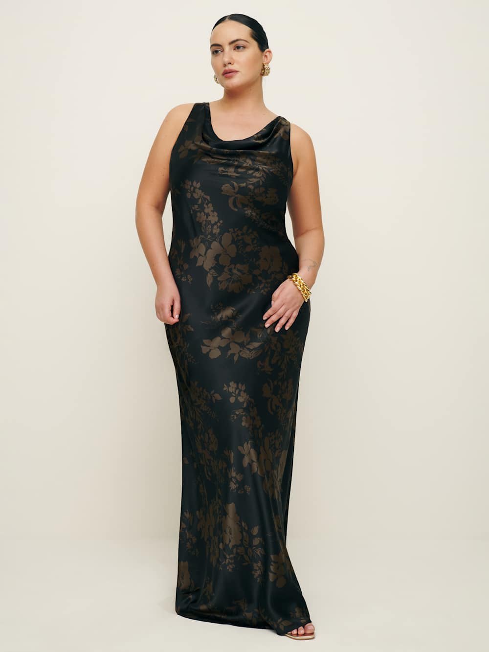 A plus-size, black-and-brown floral maxi slip dress