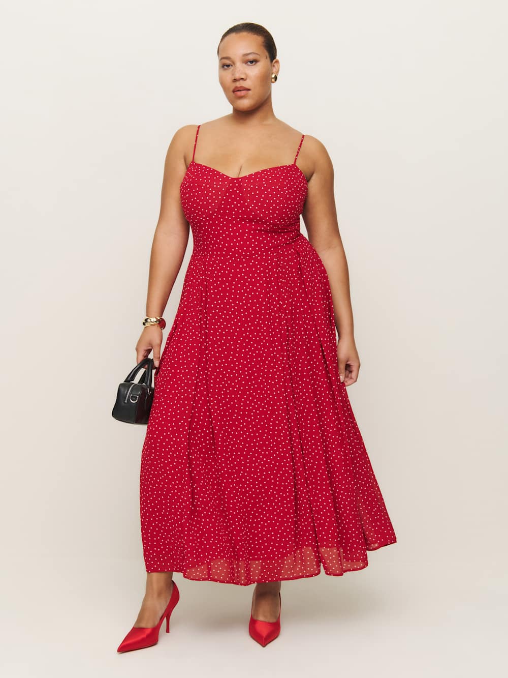 A plus-size red dress with white polka dots