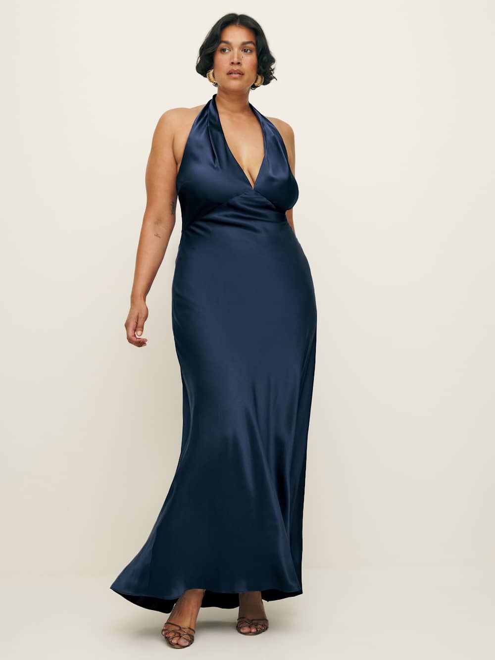 A plus-size, navy, halter maxi slip dress