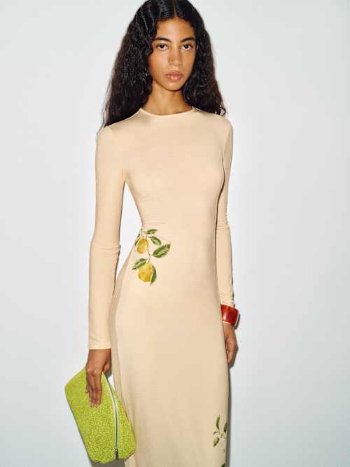 reformation tommie knit dress | Yellow Maxi dresses An undone bouquet is scattered across the verdant background of a soft knit dress mostly made from sustainable Tencel lyocell. Tommie Knit Reformation Dress |