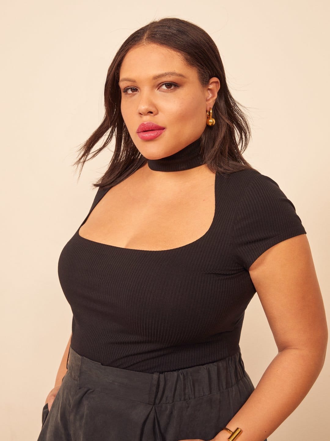 a midi length, fit and flare dress with a scoop neckline