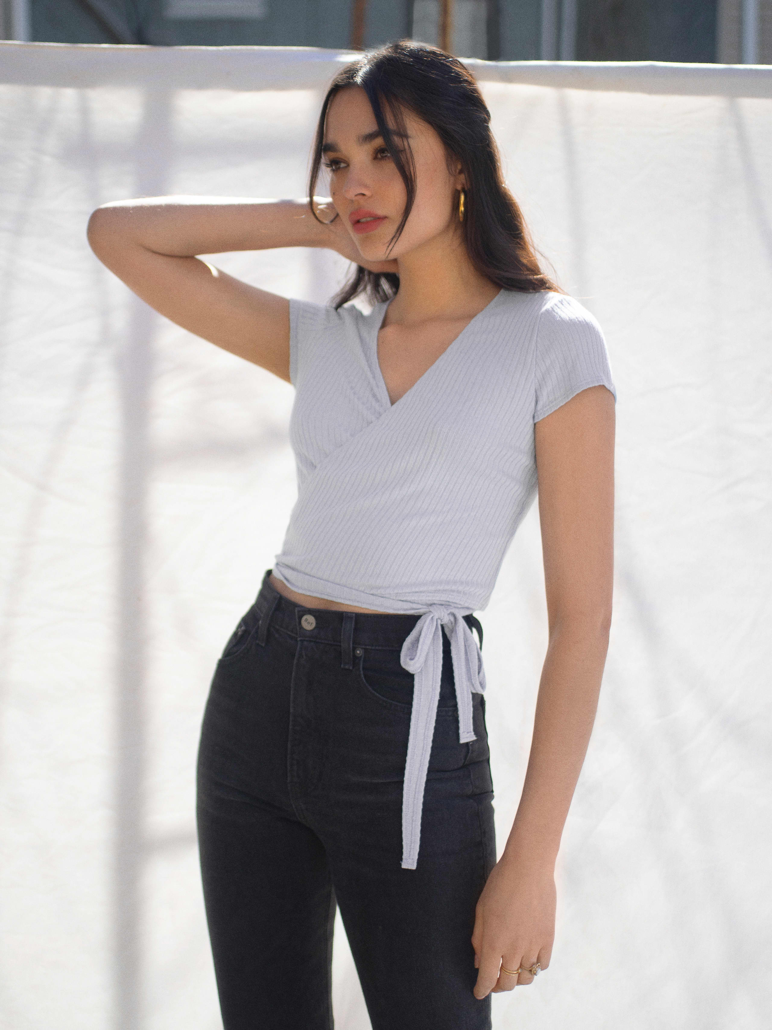 light blue wrap top with a v neckline 