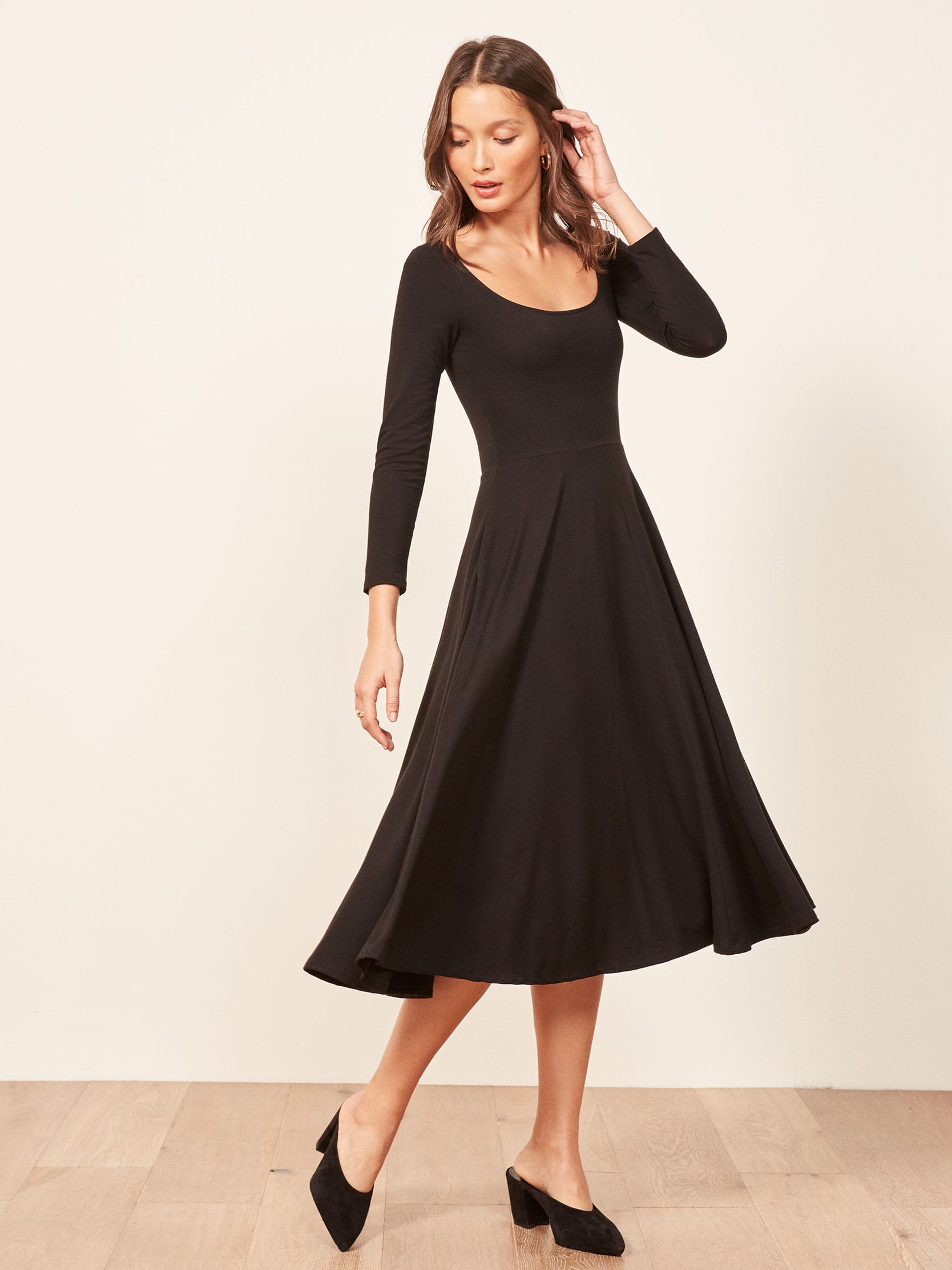 midi length black dress with sleeves